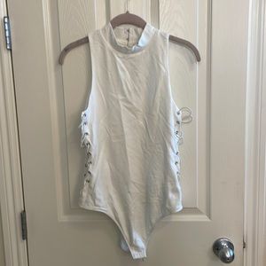 White body suit with side lacing